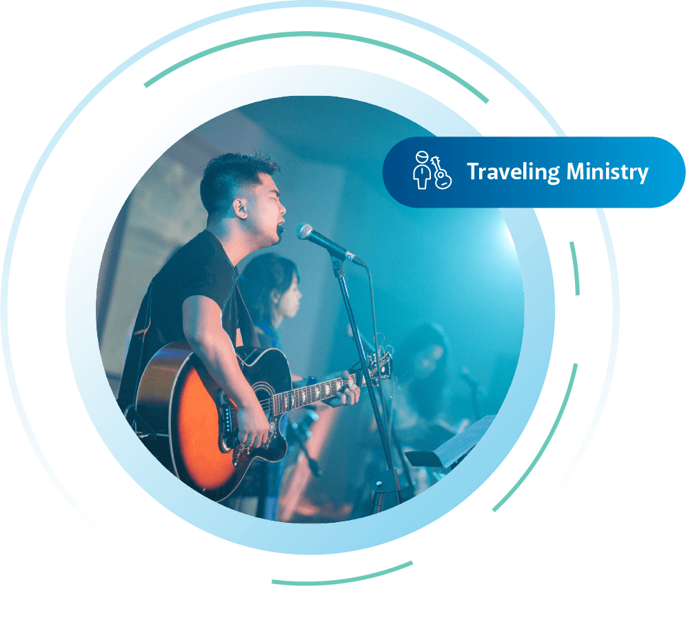 Picture of traveling worship leader singing and leading worship at an event